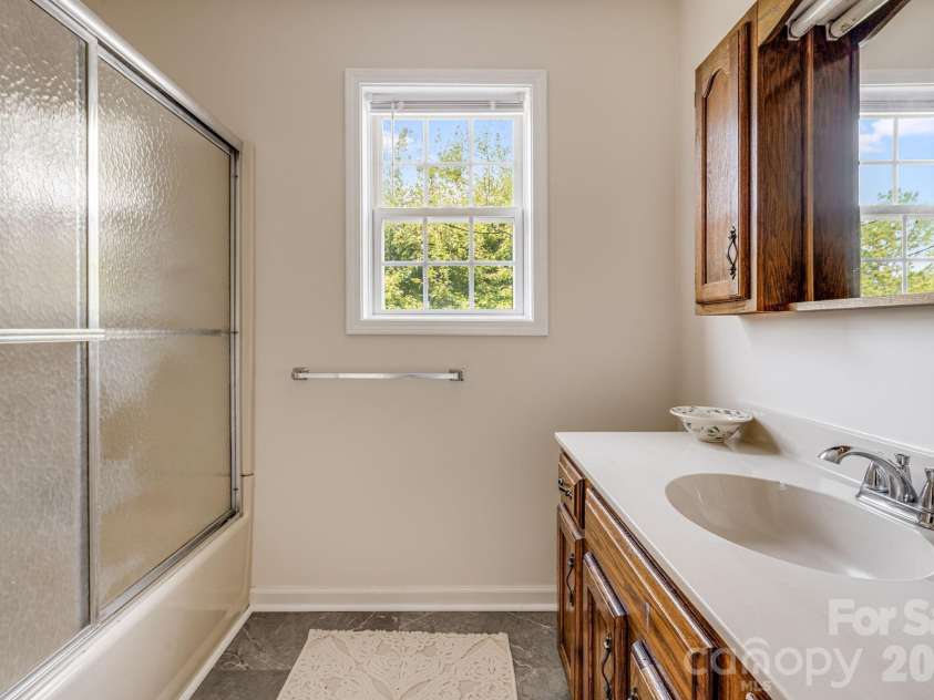 303 Hunter Street, Burnsville, NC 28714.  MLS# CAR4413835, YatesRealty ID 43668. 