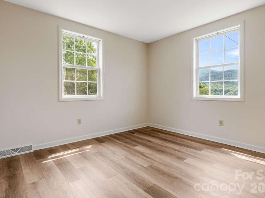 303 Hunter Street, Burnsville, NC 28714.  MLS# CAR4413835, YatesRealty ID 43668. 