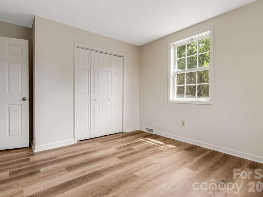 303 Hunter Street, Burnsville, NC 28714.  MLS# CAR4413835, YatesRealty ID 43668. 