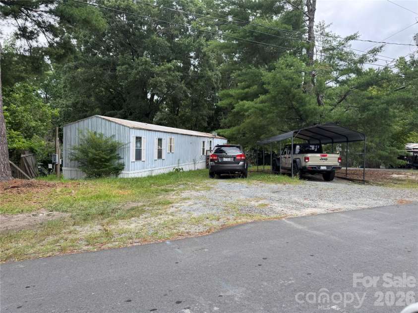 00 Friendship Drive, Matthews, NC 28105.  MLS# CAR4413832, YatesRealty ID 43669. FRONT VIEW