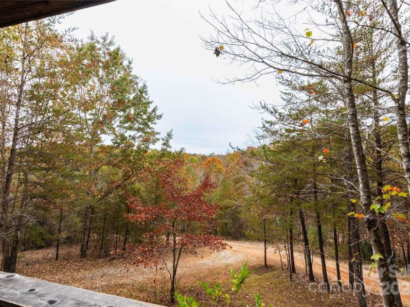 1446 Mcguinn Road, Mill Spring, NC 28756.  MLS# CAR4195239, YatesRealty ID 4367. View from front porch