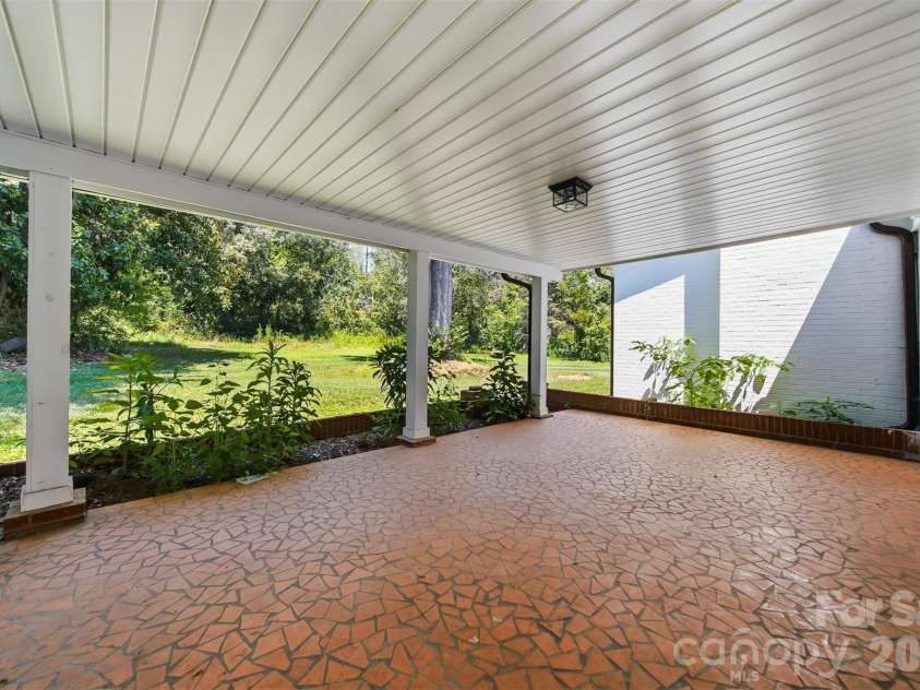 908 13th Street, Conover, NC 28613.  MLS# CAR4411974, YatesRealty ID 43674. Large peaceful back porch