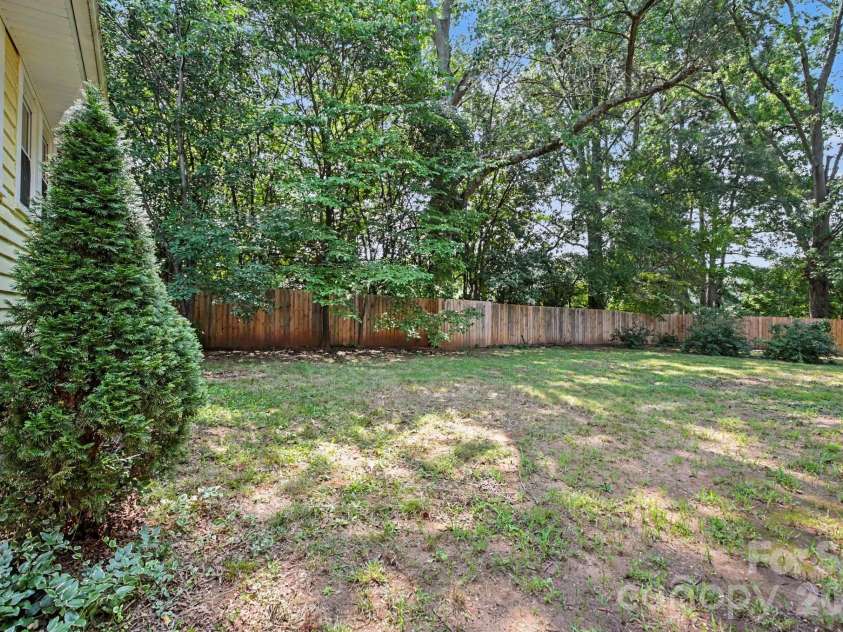 705 Maupin Avenue, Salisbury, NC 28144.  MLS# CAR4413524, YatesRealty ID 43677. Fully privacy-fenced back yard