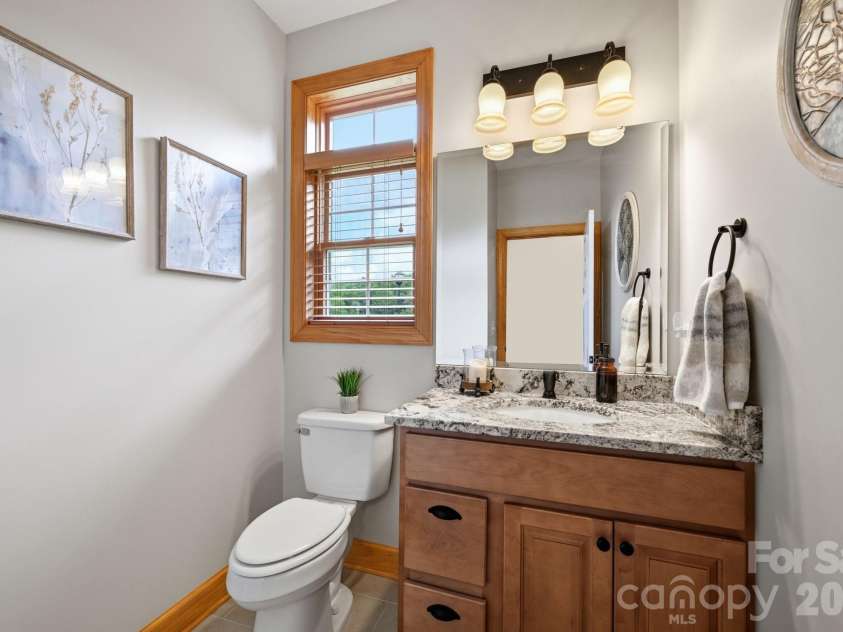 172 Whispering Streams Court, Fleetwood, NC 28626.  MLS# CAR4413390, YatesRealty ID 43678. Guest Half Bath