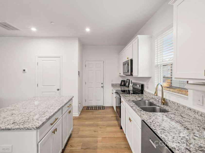 3011 Langhorne Avenue, Concord, NC 28027.  MLS# CAR4301431, YatesRealty ID 43685. View to garage entry