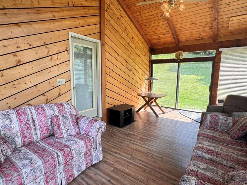189 Old NC 181 Highway, Newland, NC 28657.  MLS# CAR4413944, YatesRealty ID 43698. Sunroom