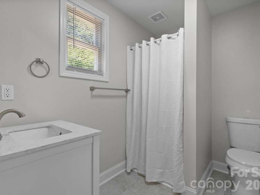 12 Ruth Avenue, Newton, NC 28658.  MLS# CAR4414166, YatesRealty ID 43712. Primary Bath