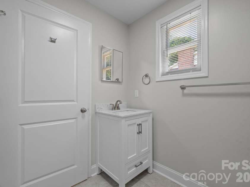 12 Ruth Avenue, Newton, NC 28658.  MLS# CAR4414166, YatesRealty ID 43712. Primary Bath