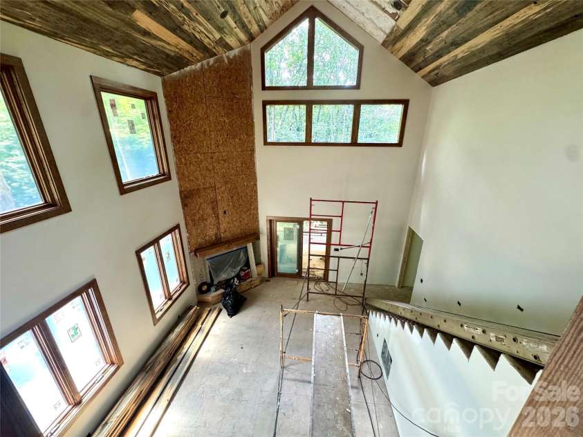 54 Hamlin Lane, Mars Hill, NC 28754.  MLS# CAR4413783, YatesRealty ID 43718. Great Room View from Loft