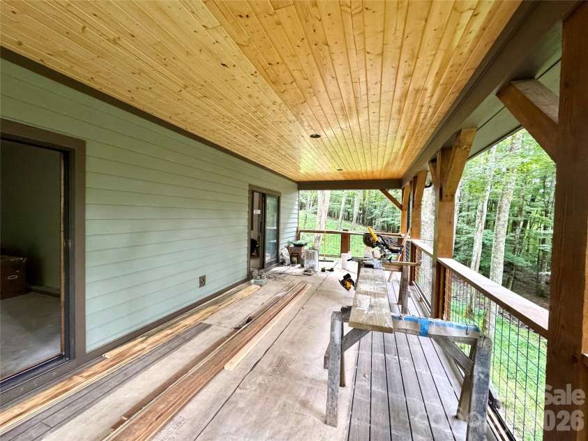 54 Hamlin Lane, Mars Hill, NC 28754.  MLS# CAR4413783, YatesRealty ID 43718. Main Level Deck