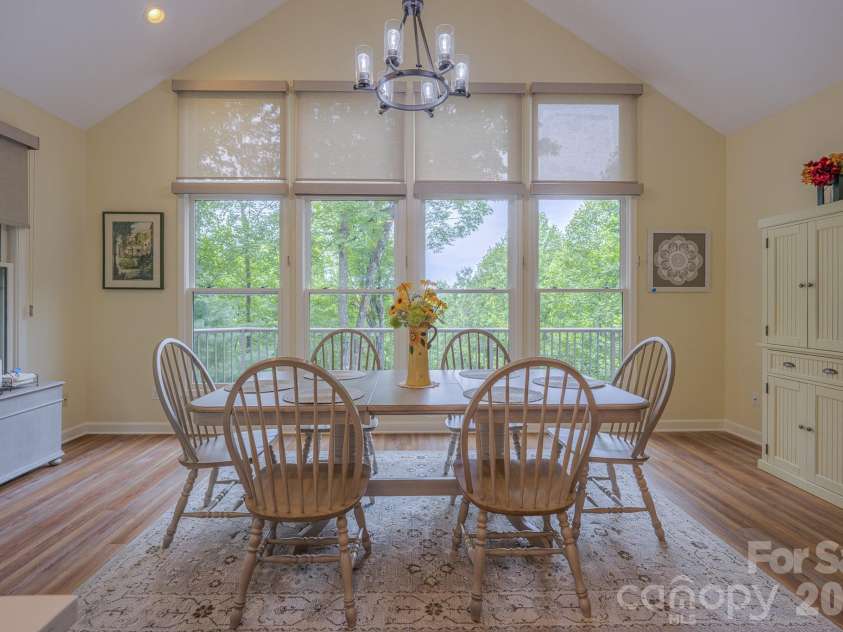 329 Mountain Crest Drive, Hendersonville, NC 28739.  MLS# CAR4384894, YatesRealty ID 43728. Dining Area with cathedral ceiling