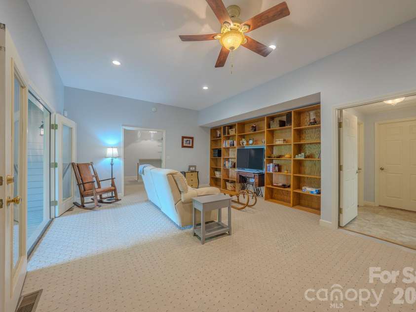 329 Mountain Crest Drive, Hendersonville, NC 28739.  MLS# CAR4384894, YatesRealty ID 43728. Lower Level Great Room