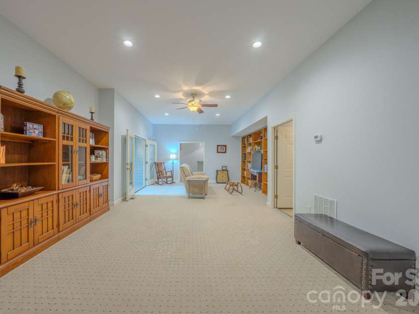 329 Mountain Crest Drive, Hendersonville, NC 28739.  MLS# CAR4384894, YatesRealty ID 43728. Lower Level Great Room