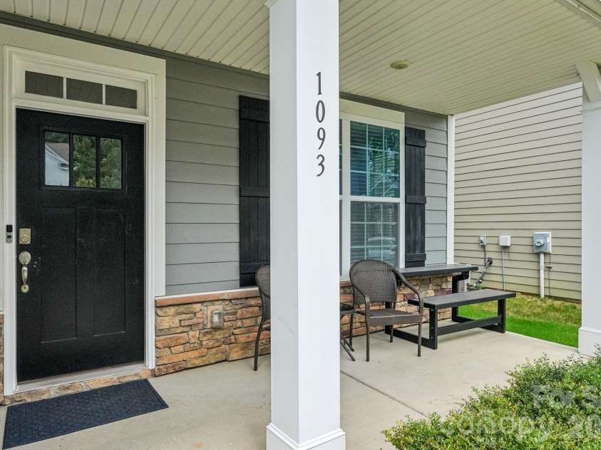 1093 Thoroughbred Drive, Iron Station, NC 28080.  MLS# CAR4413596, YatesRealty ID 43730. Front porch