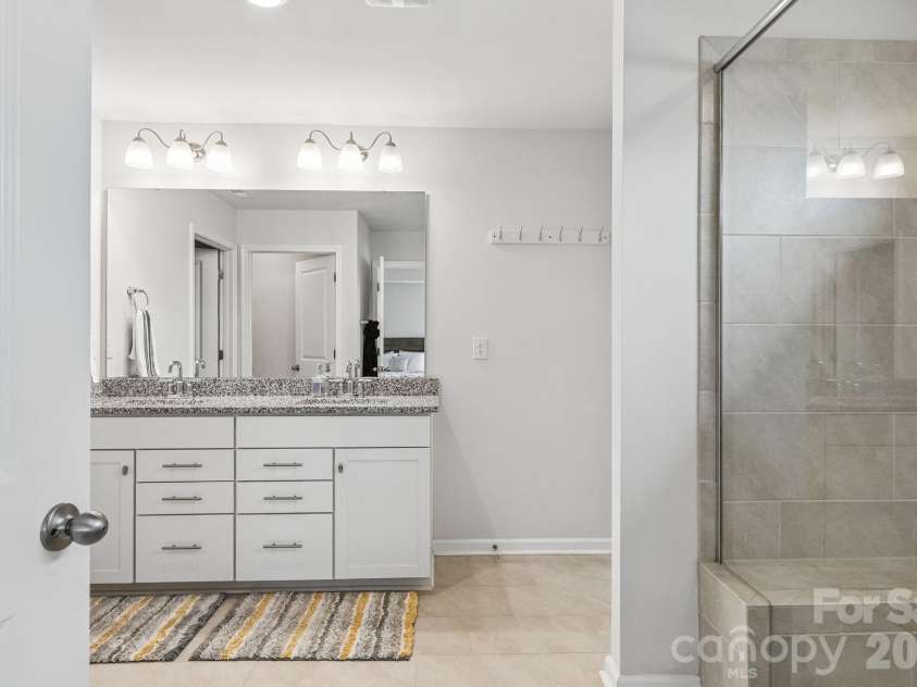 1093 Thoroughbred Drive, Iron Station, NC 28080.  MLS# CAR4413596, YatesRealty ID 43730. Primary Bathroom  Upper Level