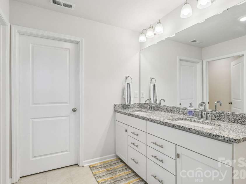 1093 Thoroughbred Drive, Iron Station, NC 28080.  MLS# CAR4413596, YatesRealty ID 43730. Primary Bathroom  Upper Level