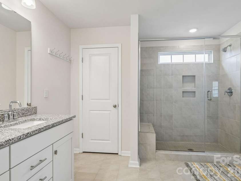 1093 Thoroughbred Drive, Iron Station, NC 28080.  MLS# CAR4413596, YatesRealty ID 43730. Primary Bathroom  Upper Level