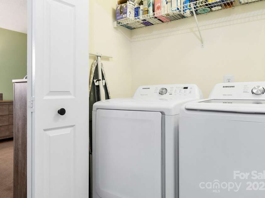 107 Forester Street, Mooresville, NC 28117.  MLS# CAR4241851, YatesRealty ID 4375. Washer and Dryer located upstairs in hallway.