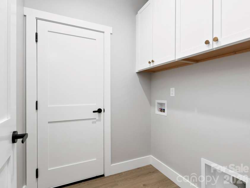 229 Asbury Road, Candler, NC 28715.  MLS# CAR4413275, YatesRealty ID 43761. Laundry Room
