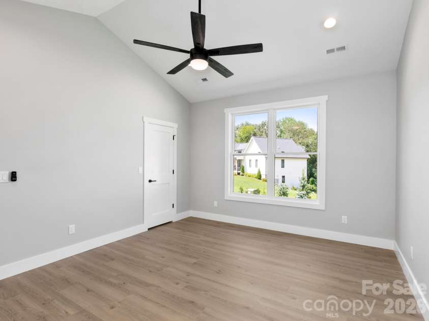 229 Asbury Road, Candler, NC 28715.  MLS# CAR4413275, YatesRealty ID 43761. Primary Bedroom