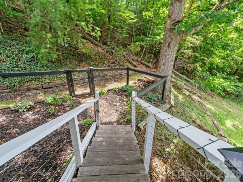386 Madison Heights Drive, Marshall, NC 28753.  MLS# CAR4411731, YatesRealty ID 43767. Fenced pet area