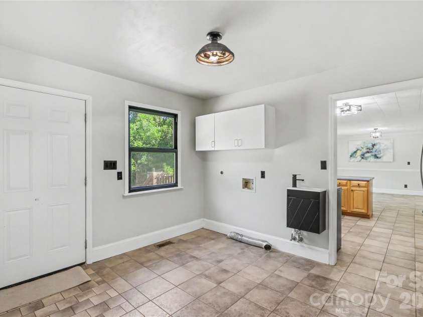163 Madison Avenue, Concord, NC 28025.  MLS# CAR4408545, YatesRealty ID 43768. Laundry/Utility