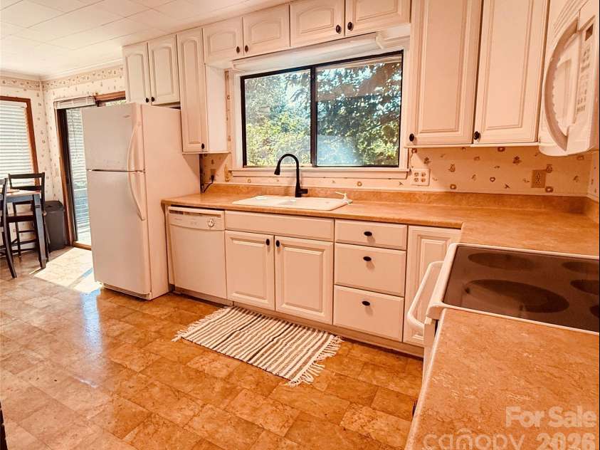218 McGuffey Ridge Road, Gerton, NC 28735.  MLS# CAR4414157, YatesRealty ID 43771. Kitchen