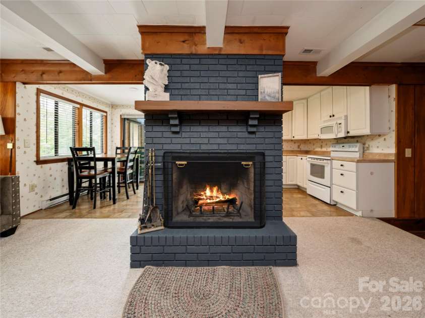 218 McGuffey Ridge Road, Gerton, NC 28735.  MLS# CAR4414157, YatesRealty ID 43771. Living/Dining/Kitchen