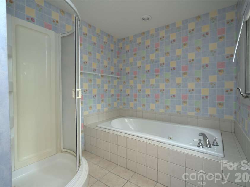 218 McGuffey Ridge Road, Gerton, NC 28735.  MLS# CAR4414157, YatesRealty ID 43771. Master bath