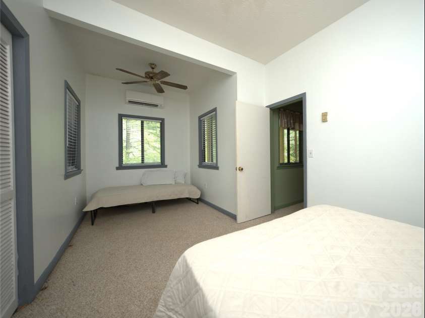 218 McGuffey Ridge Road, Gerton, NC 28735.  MLS# CAR4414157, YatesRealty ID 43771. Second bedroom in basement