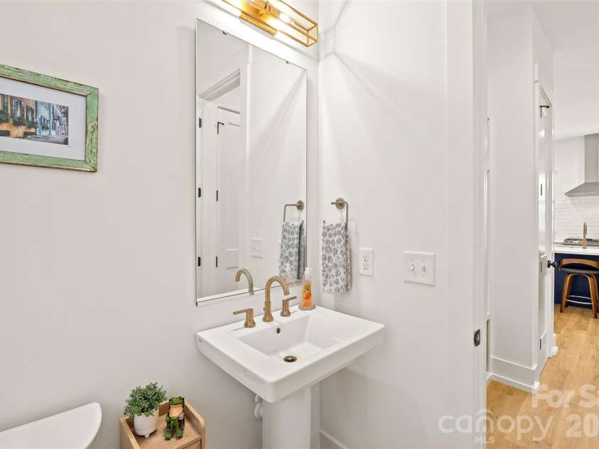 812 State Street, Charlotte, NC 28208.  MLS# CAR4412102, YatesRealty ID 43777. Downstairs half bath