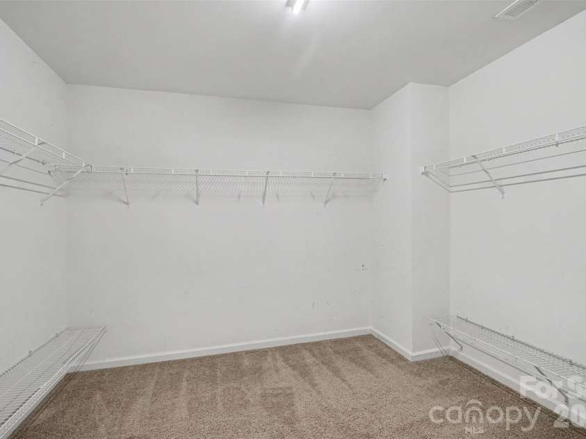 5813 Parkstone Drive, Matthews, NC 28104.  MLS# CAR4408106, YatesRealty ID 43779. Master closet