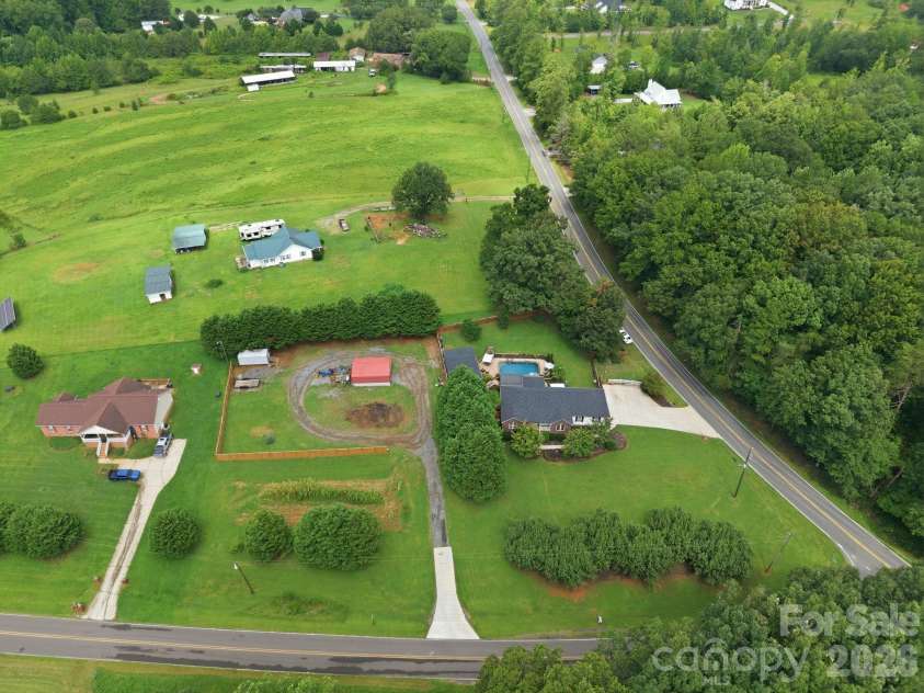 359 Huffstetler Lake Road, Dallas, NC 28034.  MLS# CAR4413475, YatesRealty ID 43785. Gray storage building (left rear corner) does not convey