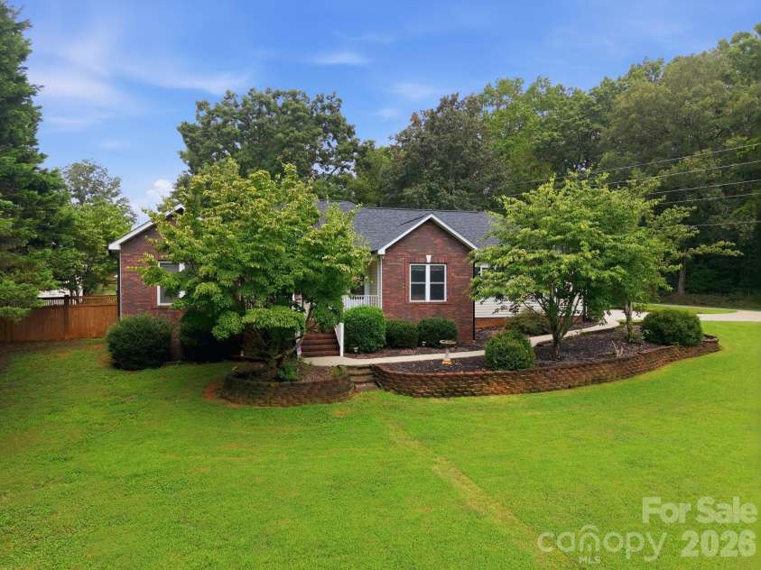 359 Huffstetler Lake Road, Dallas, NC 28034.  MLS# CAR4413475, YatesRealty ID 43785. Partial brick front exterior