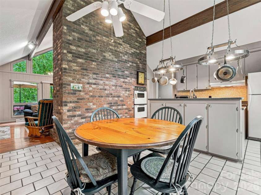 201 Valeria Lane, Pisgah Forest, NC 28768.  MLS# CAR4413829, YatesRealty ID 43787. Open Kitchen/Dining and Living Space
