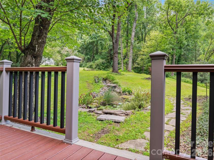 201 Valeria Lane, Pisgah Forest, NC 28768.  MLS# CAR4413829, YatesRealty ID 43787. Overlooking Koi Pond