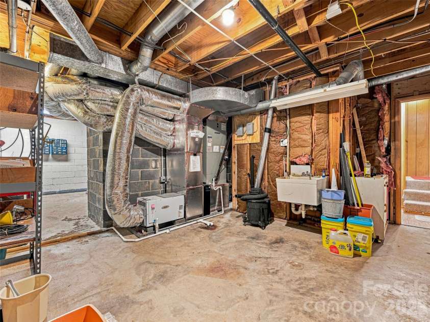 201 Valeria Lane, Pisgah Forest, NC 28768.  MLS# CAR4413829, YatesRealty ID 43787. Unfinshed basement Space/Workshop