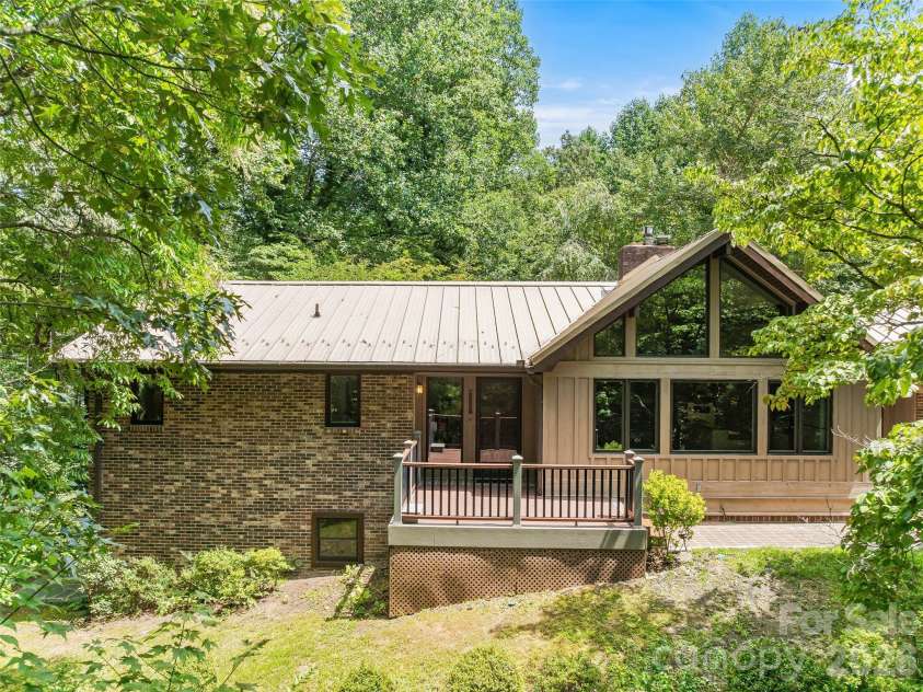 201 Valeria Lane, Pisgah Forest, NC 28768.  MLS# CAR4413829, YatesRealty ID 43787. Windows allowing natural light into Kitchen