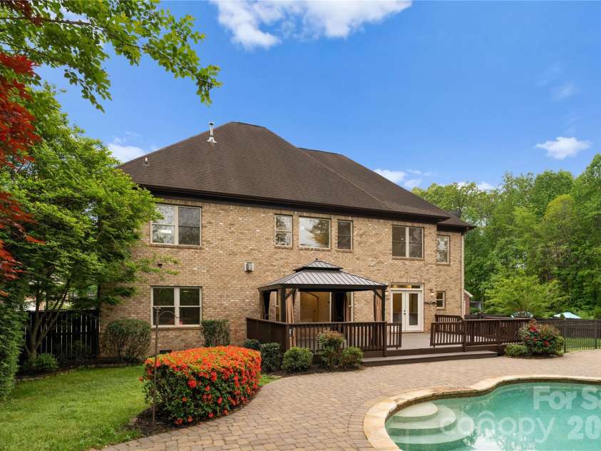 7307 Roseland Avenue, Charlotte, NC 28277.  MLS# CAR4413128, YatesRealty ID 43790. Back Exterior with Pool