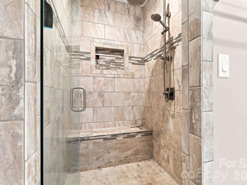295 Idlewood Drive, Marion, NC 28752.  MLS# CAR4412940, YatesRealty ID 43791. Ensuite shower