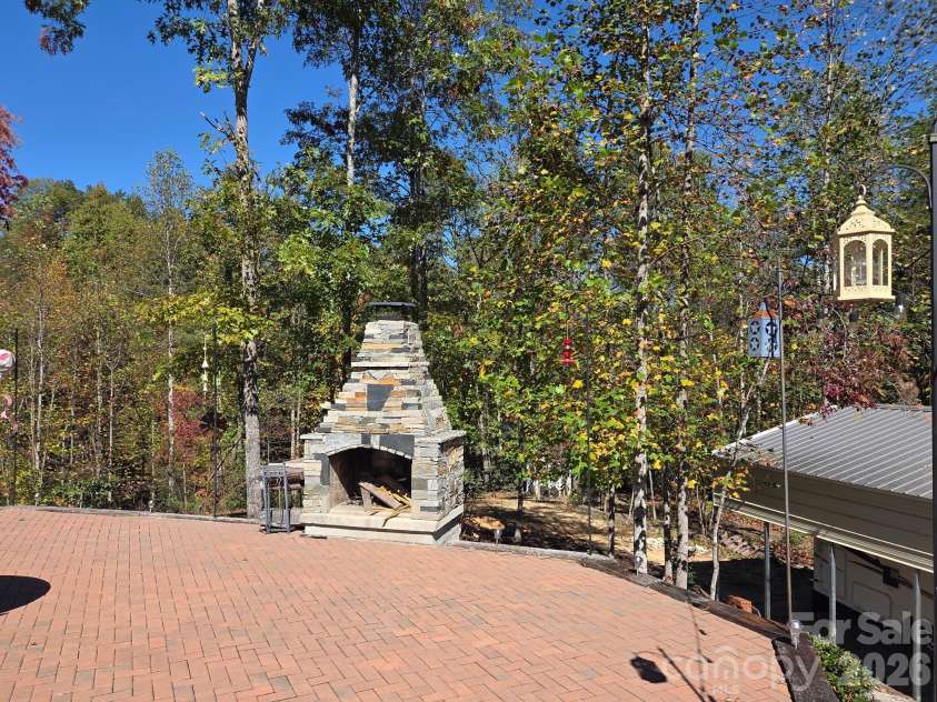 295 Idlewood Drive, Marion, NC 28752.  MLS# CAR4412940, YatesRealty ID 43791. Impressive outside fireplace