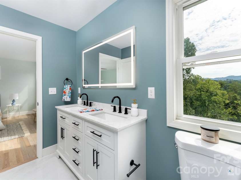 12 Crestfield Avenue, Woodfin, NC 28804.  MLS# CAR4412835, YatesRealty ID 43799. Double sinks