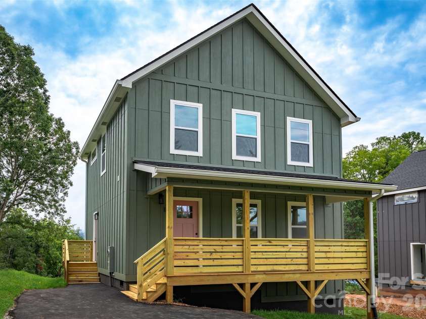 12 Crestfield Avenue, Woodfin, NC 28804.  MLS# CAR4412835, YatesRealty ID 43799. Front of home
