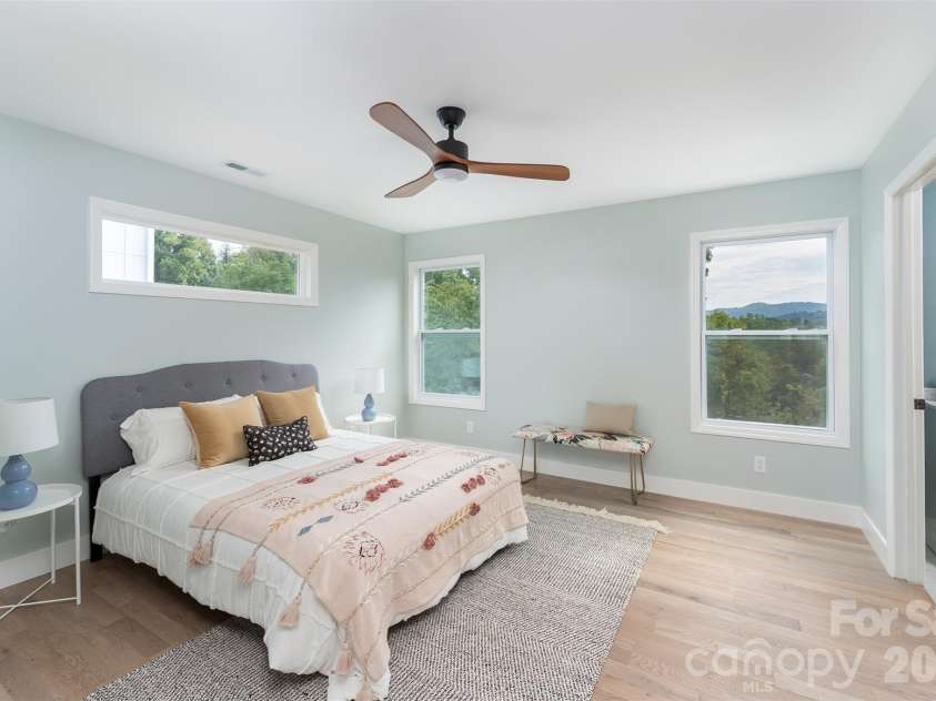 12 Crestfield Avenue, Woodfin, NC 28804.  MLS# CAR4412835, YatesRealty ID 43799. Primary bedroom