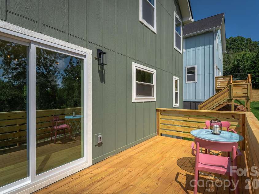12 Crestfield Avenue, Woodfin, NC 28804.  MLS# CAR4412835, YatesRealty ID 43799. Slider to dining area