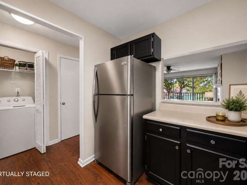 7500 Woods Lane, Cornelius, NC 28031.  MLS# CAR4413379, YatesRealty ID 43800. Kitchen, look at that view! virtually staged