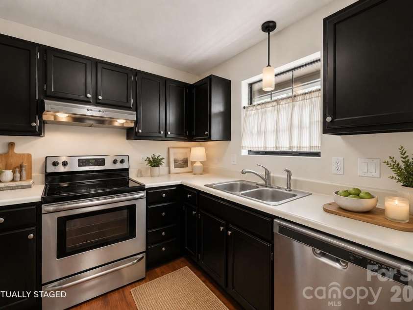 7500 Woods Lane, Cornelius, NC 28031.  MLS# CAR4413379, YatesRealty ID 43800. Kitchen virtually staged