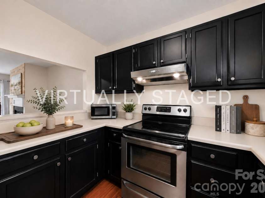 7500 Woods Lane, Cornelius, NC 28031.  MLS# CAR4413379, YatesRealty ID 43800. Kitchen virtually staged