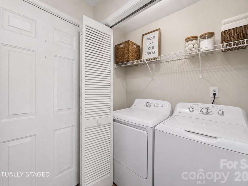 7500 Woods Lane, Cornelius, NC 28031.  MLS# CAR4413379, YatesRealty ID 43800. Laundry closet off front door
