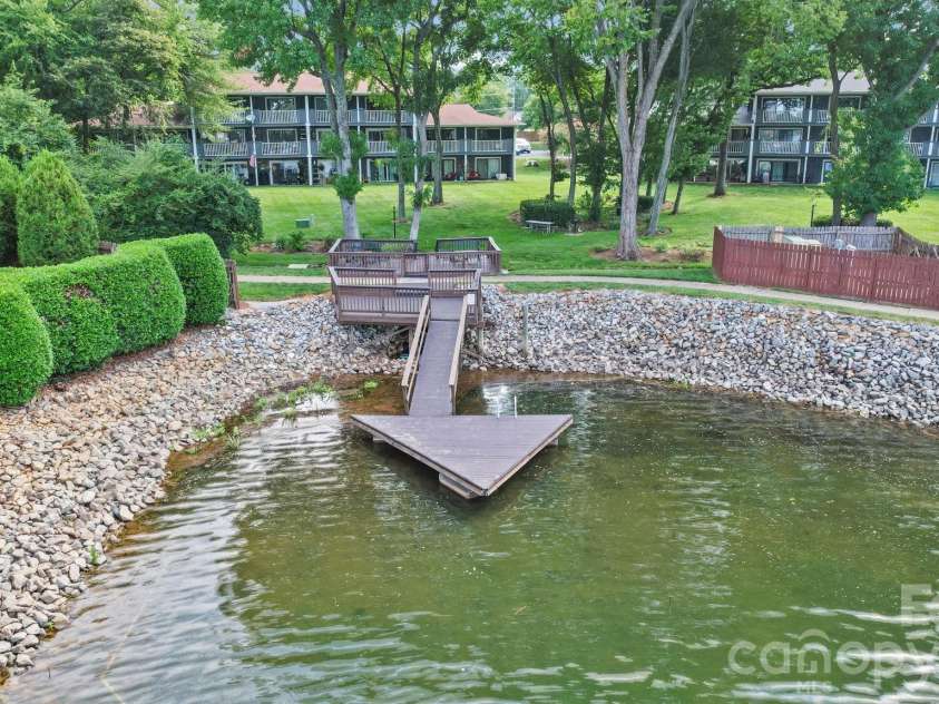 7500 Woods Lane, Cornelius, NC 28031.  MLS# CAR4413379, YatesRealty ID 43800. The dock steps away from your condo!